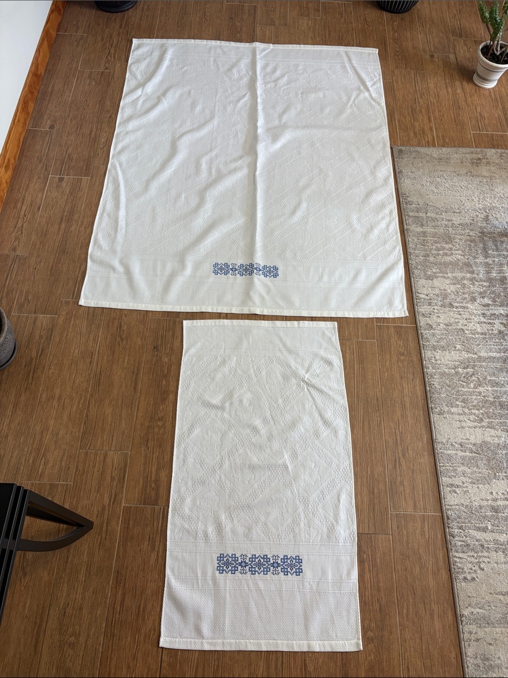 White Embroidered Linen Towels with Blue Floral Motif